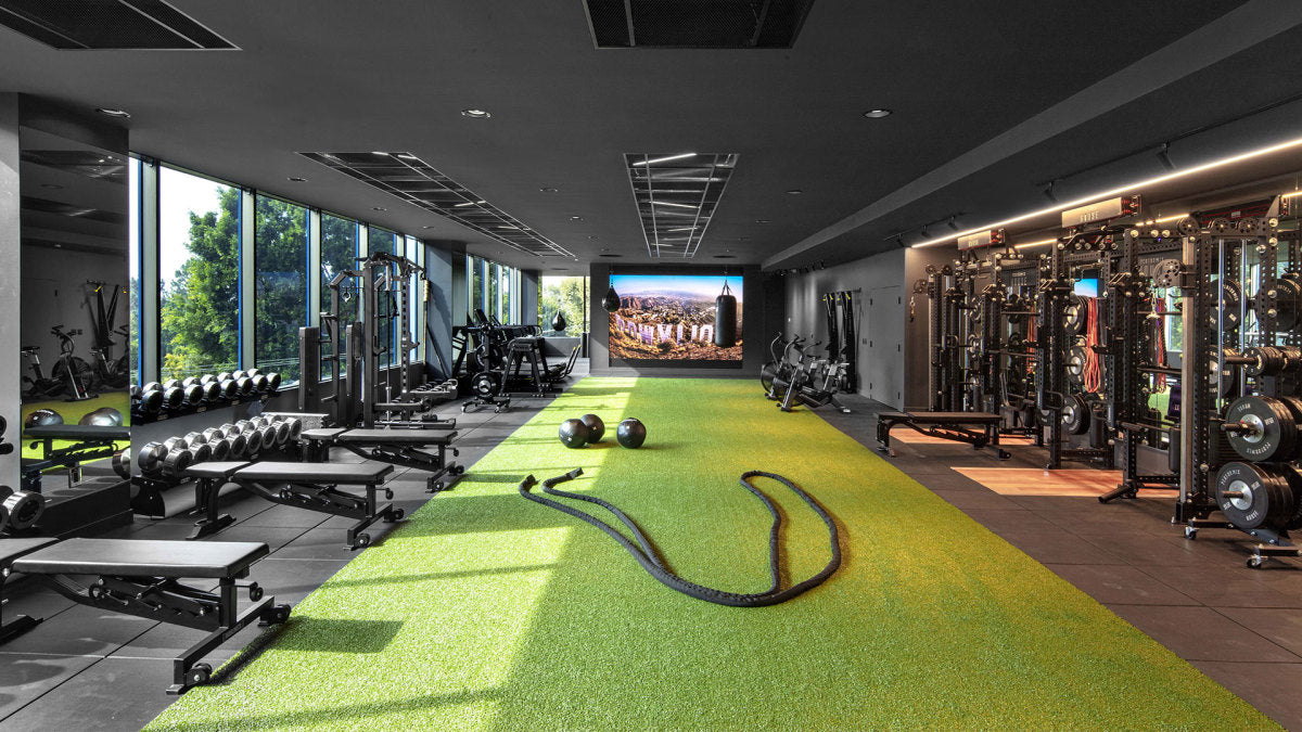 Best selection of rubber and other sports flooring. Flooring Store in Kitchener Waterloo Region (Cambridge, Guelph and across Ontario) selling and installing porcelain and ceramic tiles, mosaics, marble, travertine, slate, hardwood, laminate, vinyl, linoleum, marmoleum, carpet, cork, countertops, polished concrete and epoxy flooring. Also Heated flooring and water proofing showers, steam rooms. Here for your residential and commercial renovations and new build projects.